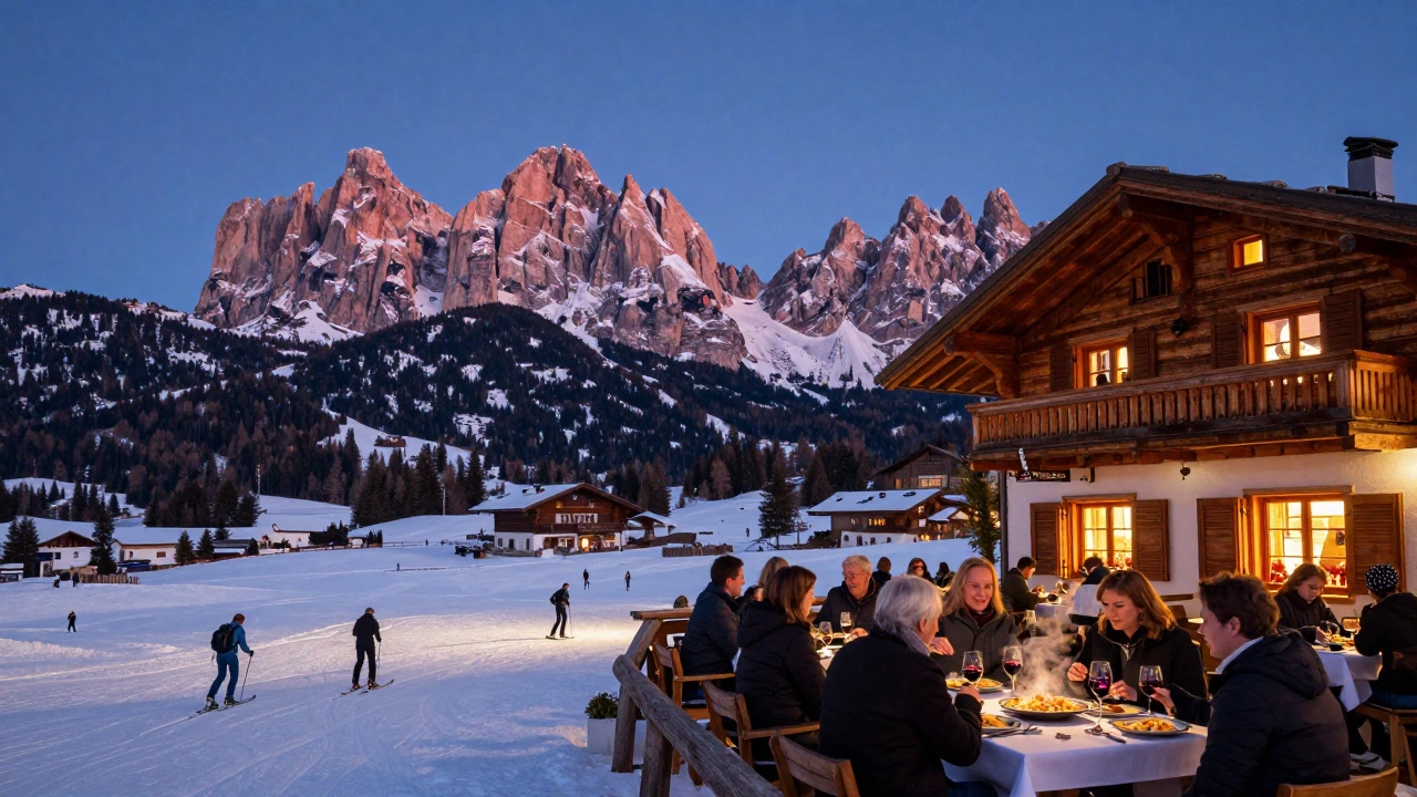 Панорама Доломитов в Италии на закате, с розовыми скалами и лыжниками на склонах.